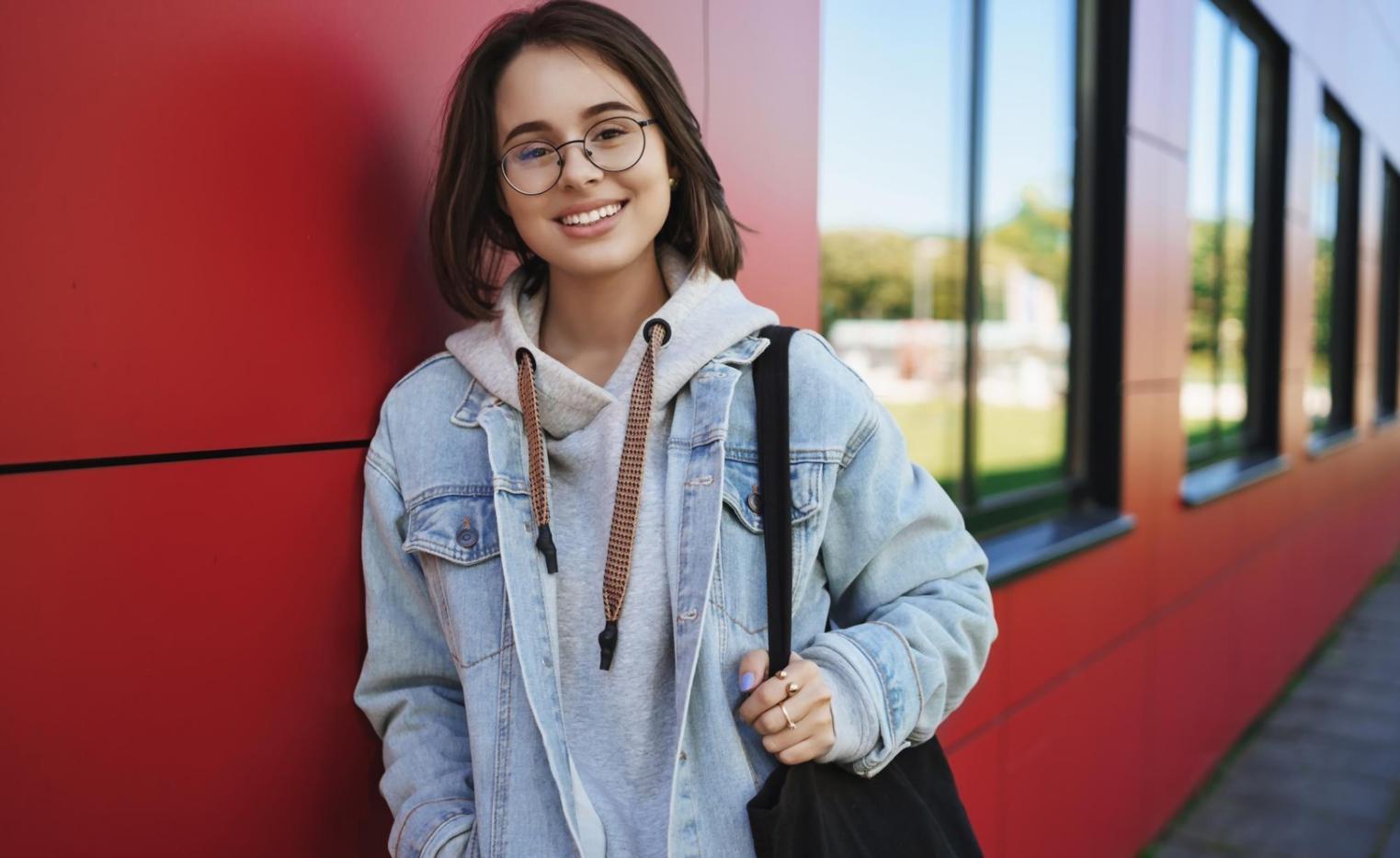 Person reviewing financial documents and budget planning materials